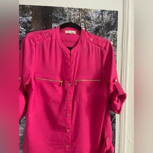 Women’s pink shirt. Size M. Good condition.